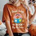 Bookworm Teacher Librarian Reading Donut Pun Literacy Women's Oversized Comfort T-Shirt Yam