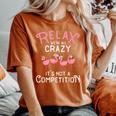 Relax Were All Crazy Its Not A Competition Flamingo Women's Oversized Comfort T-shirt Yam