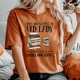 Never Underestimate An Old Lady Who Loves Books And Coffee Women's Oversized Comfort T-Shirt Yam