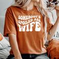 Wife Somebodys Spoiled Ass Wife Retro Groovy Women's Oversized Comfort T-shirt Yam