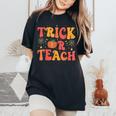 Groovy Trick Or Teach Halloween Teacher Life Girl Women's Oversized Comfort T-Shirt Black