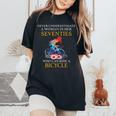 Never Underestimate Woman In Her Seventies Rides A Bicycle Women's Oversized Comfort T-Shirt Black