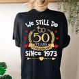 50Th Wedding Anniversary We Still Do 50 Years Ago Since 1973 Women's Oversized Comfort T-shirt Back Print Black