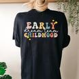 Early Childhood Dream Team Daycare Teacher Toddler Teacher Women's Oversized Comfort T-shirt Back Print Black
