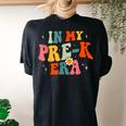 In My Prek Teacher Era Preschool Teacher Groovy Retro Women's Oversized Comfort T-shirt Back Print Black