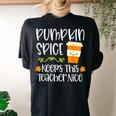 Pumpkin Spice Keeps This Teacher Nice Fall Halloween Autumn Women's Oversized Comfort T-shirt Back Print Black