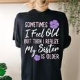 Sometimes I Feel Old But Then I Realize My Sister Is Older Women's Oversized Comfort T-Shirt Back Print Black
