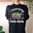 I Teach Future Super Heroes Teaching Mother Day Women's Oversized Comfort T-shirt Back Print Black