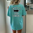 Couples Halloween Costume Im With The Sexy Cowgirl Women's Oversized Comfort T-Shirt Back Print Chalky Mint
