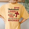 November Never Underestimate A Grandma Covered By The Blood Women's Oversized Comfort T-Shirt Back Print Mustard