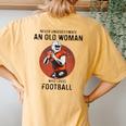 Never Underestimate An Old Woman Who Loves Football Women's Oversized Comfort T-Shirt Back Print Mustard