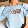 Groovy In My Spooky Teacher Era Halloween Trick Or Teach Halloween Gifts Women Oversized Sweatshirt Light Blue