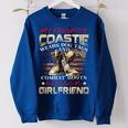 My Favorite Coastie Wears Dog Tags And Combat Boots Women Oversized Sweatshirt Royal Blue