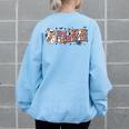 Groovy In My Spooky Teacher Era Halloween Trick Or Teach Halloween Gifts Women's Oversized Back Print Sweatshirt Light Blue