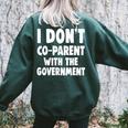I Don’T Co-Parent With The Government Mom Dad Freedom Women's Oversized Sweatshirt Back Print Forest