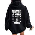 Girls Never Underestimate A Girl With Pugs Women Oversized Hoodie Back Print Black