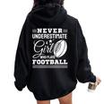 Never Underestimate A Girl Who Play Football Football Fan Women Oversized Hoodie Back Print Black