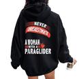 Never Underestimate Woman Paraglider Parachute Women Oversized Hoodie Back Print Black