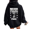 Never Underestimate A Woman With Pugs Women Oversized Hoodie Back Print Black