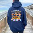 I Teach The Cutest Daycare Turkeys Thanksgiving Day Teacher Women Oversized Hoodie Back Print Navy Blue