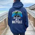 Never Underestimate An Old Guy On A Bike Mountain Mens Women Oversized Hoodie Back Print Navy Blue