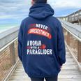 Never Underestimate Woman Paraglider Parachute Women Oversized Hoodie Back Print Navy Blue