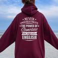 English For & Never Underestimate Women Oversized Hoodie Back Print Maroon