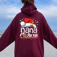Nana Claus Christmas Lights Santa Hat Pajama Family Matching Women Oversized Hoodie Back Print Maroon