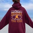 Old Never Underestimate A Grandma Who Knows Tai Chi Women Oversized Hoodie Back Print Maroon