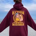 Never Underestimate An Old Woman Who Born In December Women Oversized Hoodie Back Print Maroon