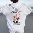 Never Underestimate An Old Lady Who Is Also A Nurse December Women Oversized Hoodie Back Print White