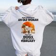 Never Underestimate An Old Woman Who Loves Dogs February Women Oversized Hoodie Back Print White