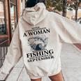 Never Underestimate Awoman Who Loves Fishing -September Women Oversized Hoodie Back Print Sand