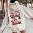Never Underestimate An Old Lady Was Born In December Women Oversized Hoodie Back Print Sand