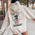 Never Underestimate An Old Lady Who Loves Dogs-November Women Oversized Hoodie Back Print Sand