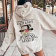 Never Underestimate An Old Lady Who Loves Sewing March Women Oversized Hoodie Back Print Sand