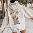 Never Underestimate An Old Lady Who Is Also A Nurse December Women Oversized Hoodie Back Print Sand