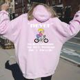Never Underestimate An Old Lady On A Bicycle Women Oversized Hoodie Back Print Light Pink