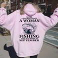 Never Underestimate Awoman Who Loves Fishing -September Women Oversized Hoodie Back Print Light Pink
