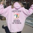 Never Underestimate An Old Lady Who Loves Books Born October Women Oversized Hoodie Back Print Light Pink