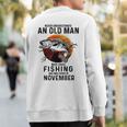 Never Underestimate An Old Man Fishing Was Born In November Sweatshirt Back Print