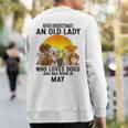 Never Underestimate An Old May Lady Who Loves Dogs Sweatshirt Back Print