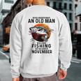 Never Underestimate An Old Man Fishing Was Born In November Sweatshirt Back Print