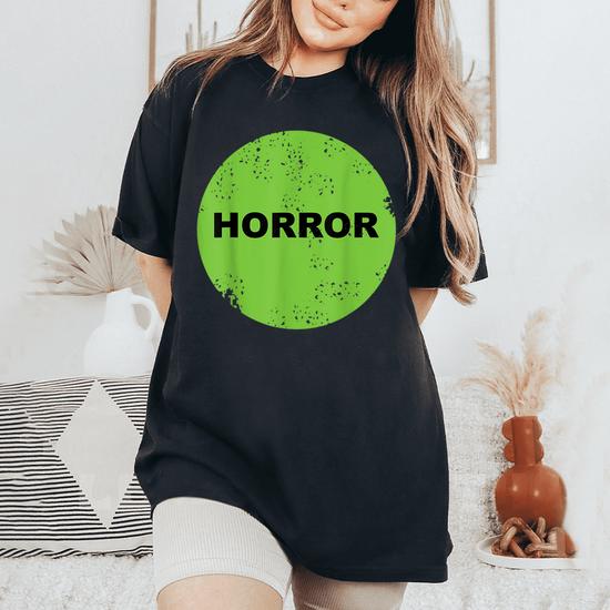 https://i3.cloudfable.net/styles/bgw/550x550/651.413/Black/retro-vhs-video-store-horror-sticker-s-oversized-comfort-t-shirt-20230818140633-jlcc4su1.jpg